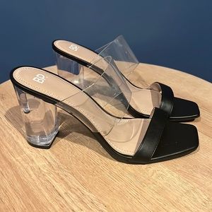 Black 4” sandals with black and clear strap. Brand: BP. Size: 9 New
